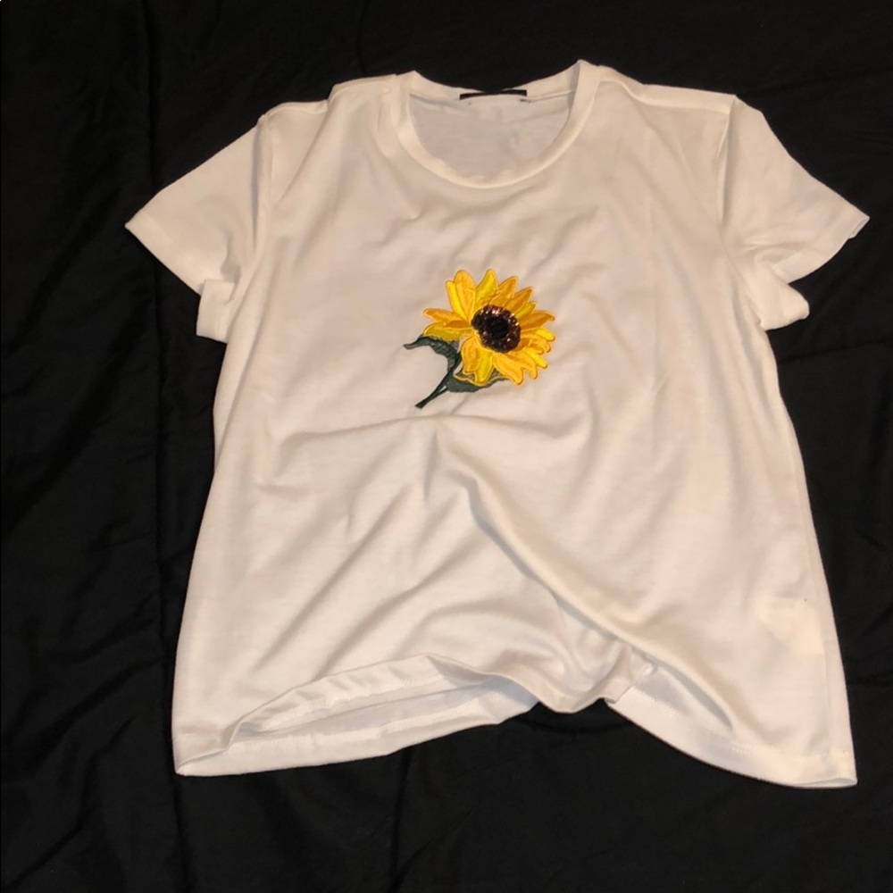 white shirt with embroidered details